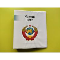 Альбом для памятных и юбилейных монет СССР с информационными листами-разделителями и прозрачными листами с ячейками.