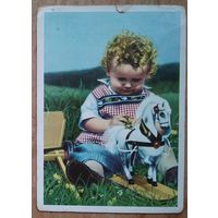 Ребенок с игрушечной лошадкой. Германия. 1950-60-е. Чистая.