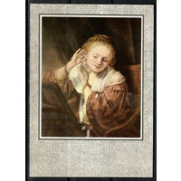 Открытка. Рембранд. " Молодая женщина, примеряющая серьги"(Ж)