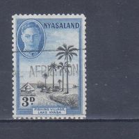 [293] Британские колонии. Ньясаленд 1945. Георг VI.Рыбачья деревня у озера Ньяса. Гашеная марка.