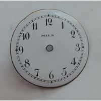 Циферблат эмалевый на карманные часы "MILA" 20-е годы. Диаметр 2.2 см.