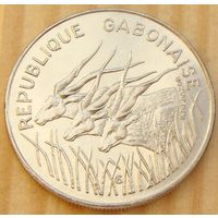Габон. 100 франков 1985 года KM#13  Тираж: 3.000.000 шт